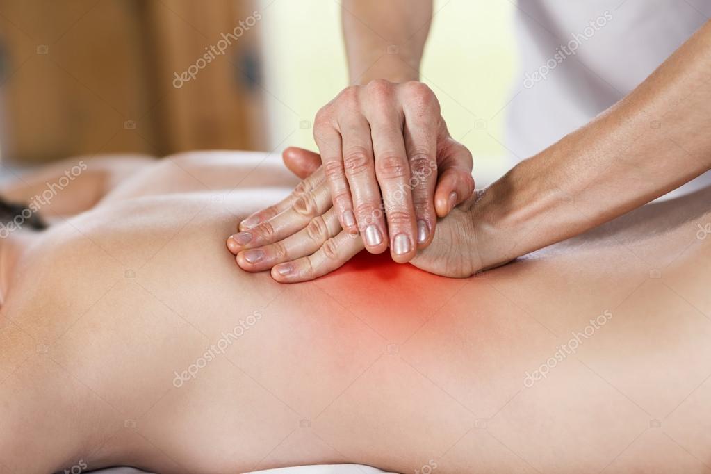 depositphotos_93888680-stock-photo-woman-getting-back-massage-at